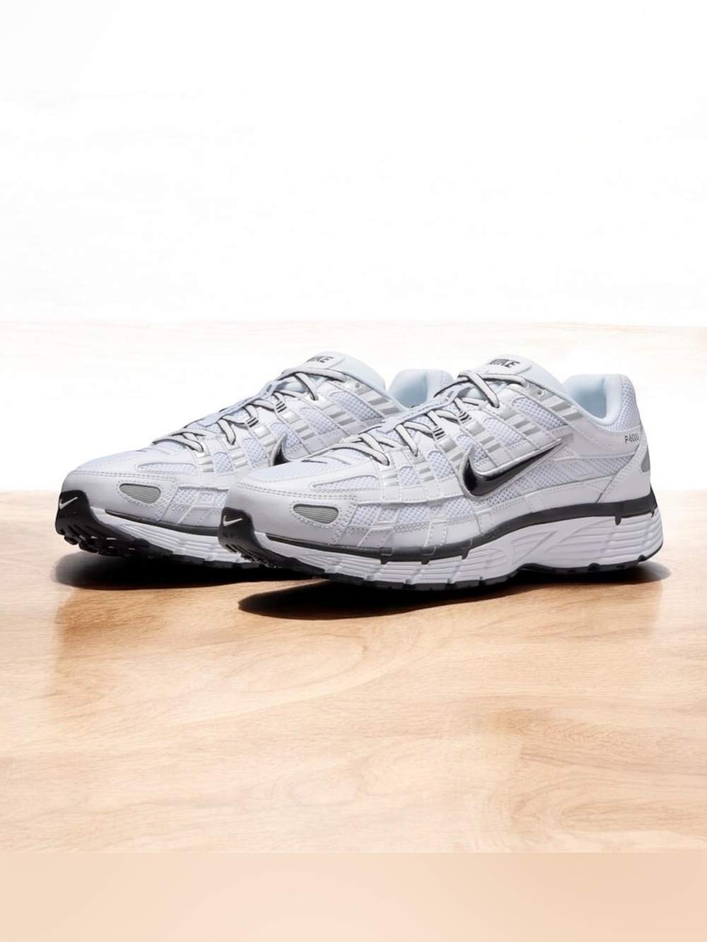 Nike Men’s White and Black Athletic Sneakers